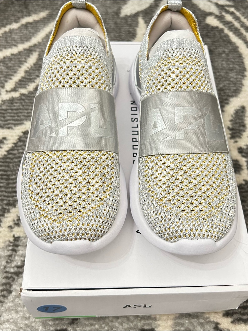 APL Techloom Bliss Kids' Slip-On Knit Sneakers in Silver and Gold Size 5